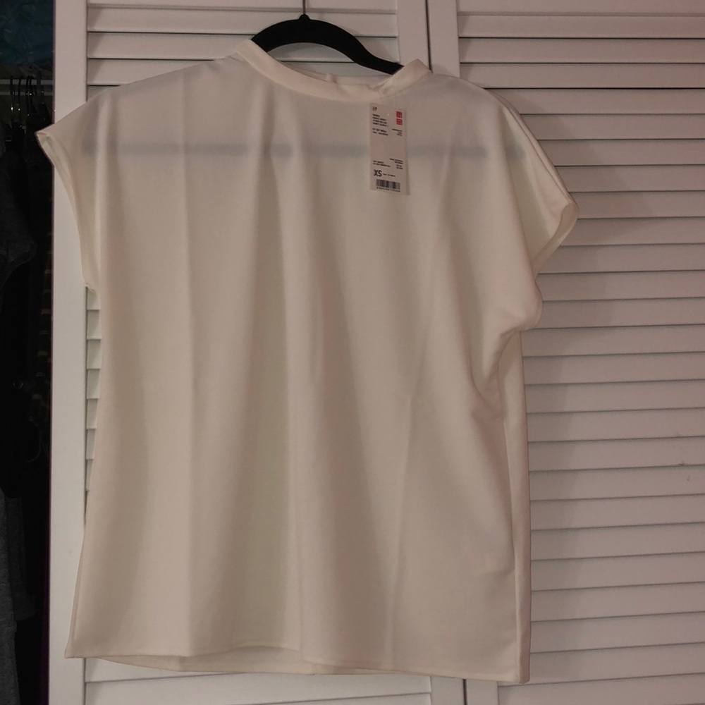 UNIQLO crepe jersey stand collar shirt sleeve tee.
